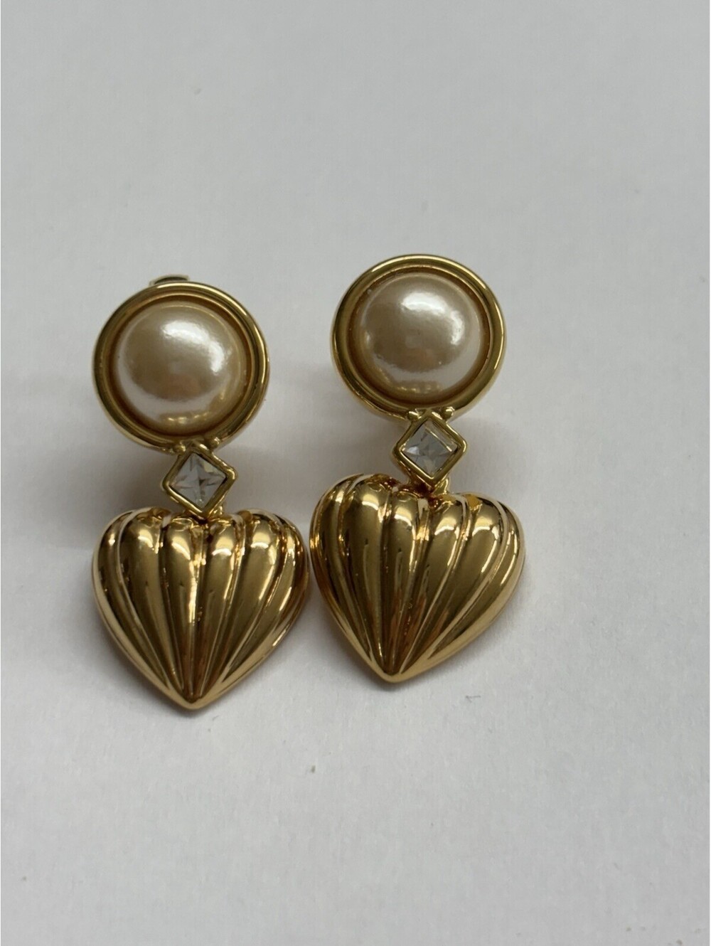 nolan miller gold tone dangle heart with faux pearl clip on earrings